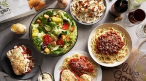  spread of Olive Garden family bundle items, including lasagna, salad, and breadsticks.